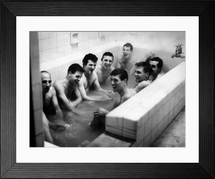 Framed Print : Burnley v. Liverpool. Liverpool players celebrating in the baths after winning 3-0