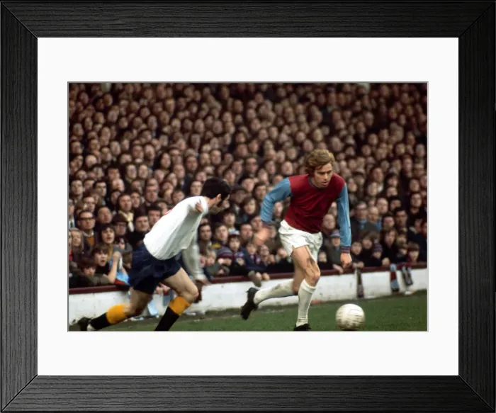 Framed Print : Harry Redknapp of West Ham United in a chase for the ball with John Robson of Derby