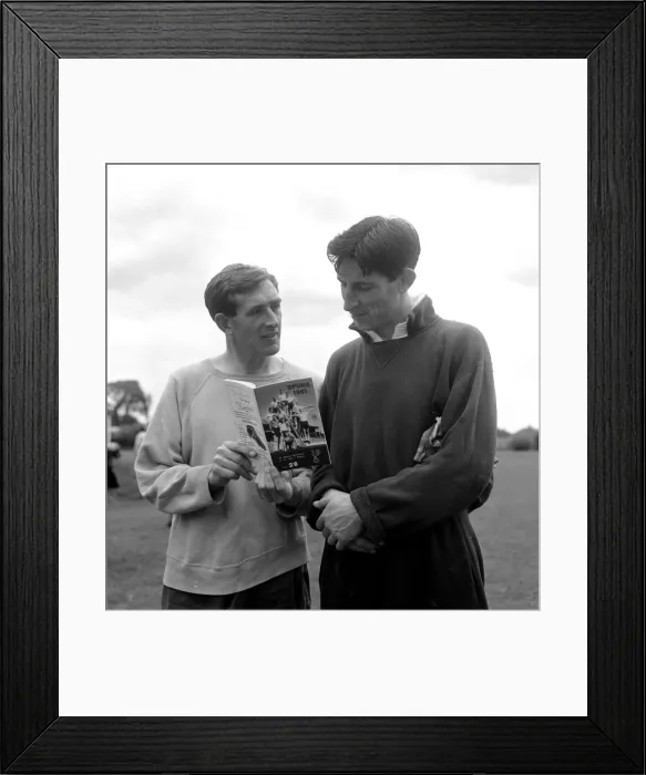 Framed Print : Tottenham Hotspur players Danny Blanchflower and goalkeeper Bill Brown holding a copy of Framed Print : Tottenham Hotspur players Danny Blanchflower and goalkeeper Bill Brown holding a copy of