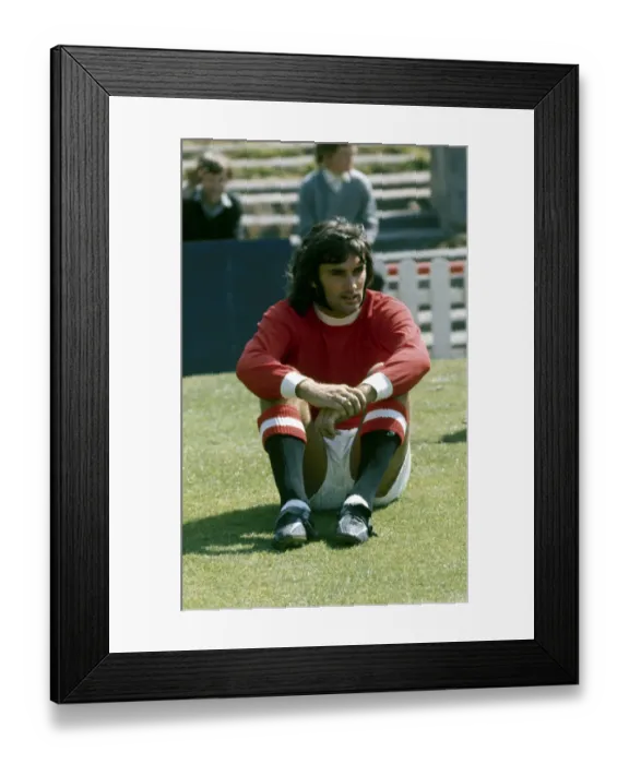 Framed Print : Manchester United footballer George Best at a training session for his club April