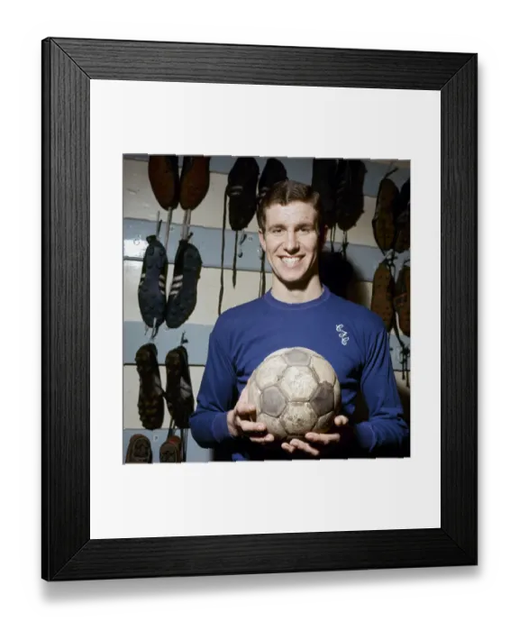 Framed Print : Chelsea footballer Peter Osgood in the boot room at Stamford Bridge February 1966 Framed Print : Chelsea footballer Peter Osgood in the boot room at Stamford Bridge February 1966