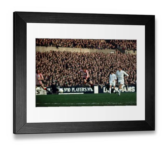 Framed Print : Stewart Scullion of Sheffield United shoots at goal during their English League Division