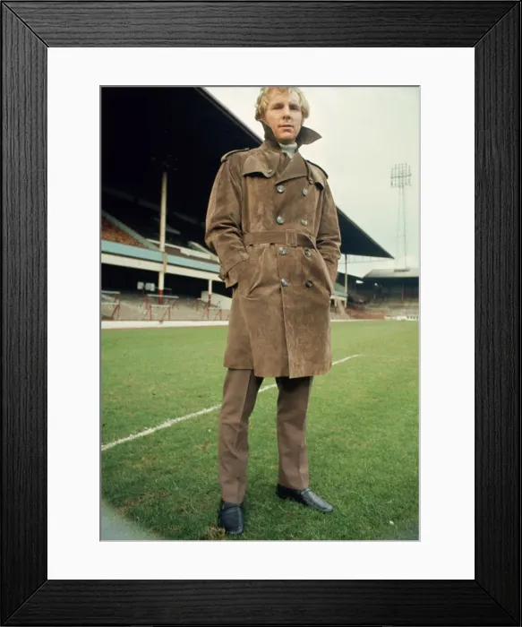 Framed Print : West Ham United footballer Bobby Moore modelling a coat at Upton park February Framed Print : West Ham United footballer Bobby Moore modelling a coat at Upton park February