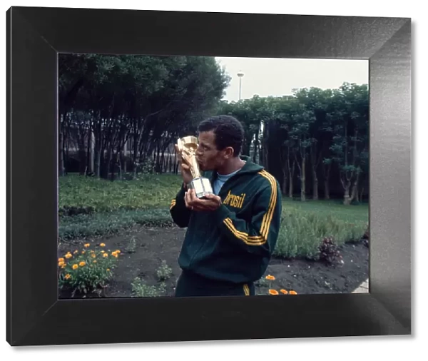 Brazil captain Carlos Alberto kisses the Jules Rimet World cup trophy following their