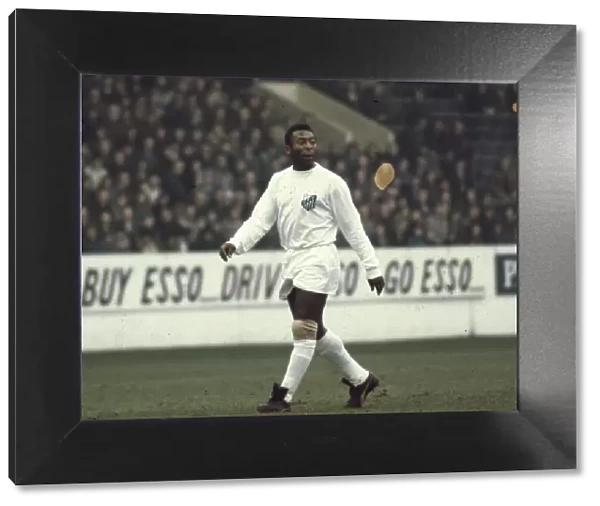 Legendary Brazilian footballer Pele in action for club side Santos during the match