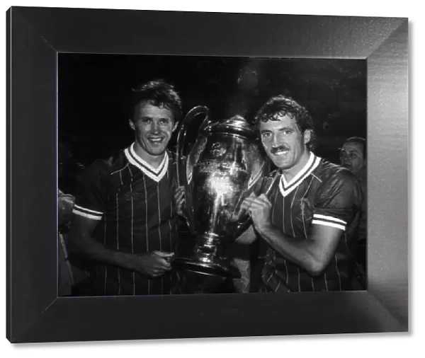 Liverpool FC players Phil Neal and Alan Kennedy with the European Cup