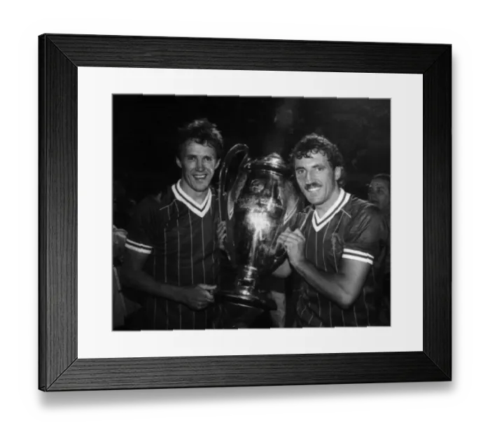 Framed Print : Liverpool FC players Phil Neal and Alan Kennedy with the European Cup