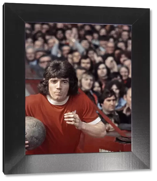 Liverpool footballer Kevin Keegan walks out onto the pitch before a match at Anfield