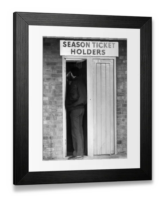 Framed Print : Kevin Moseley and friend entering West Ham Football Club at the season ticket holder