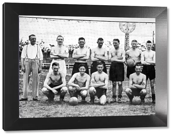 Liverpool football team pose for a group photograph during their tour of the Balknas
