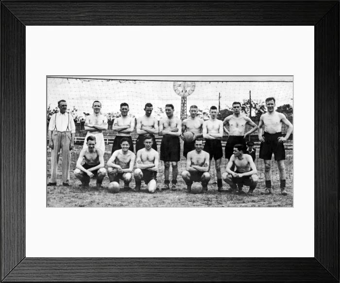 Framed Print : Liverpool football team pose for a group photograph during their tour of the Balknas