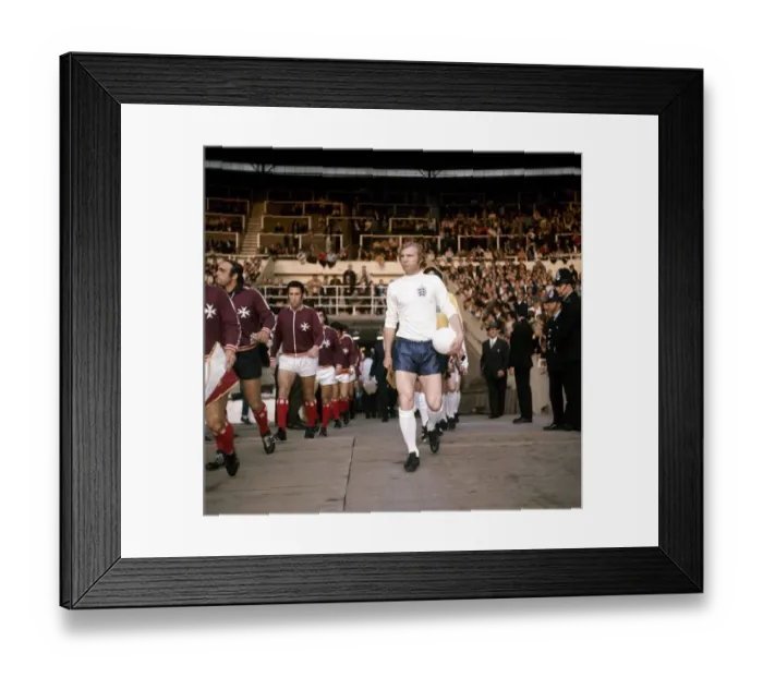 Framed Print : Bobby Moore seen here leading the England team out in the match against Malta played Framed Print : Bobby Moore seen here leading the England team out in the match against Malta played