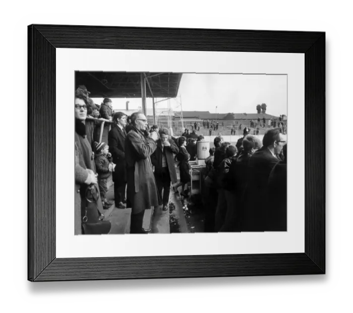 Framed Print : Rotherham Football Club. Supporters buying tea from an Urn in the stands Framed Print : Rotherham Football Club. Supporters buying tea from an Urn in the stands