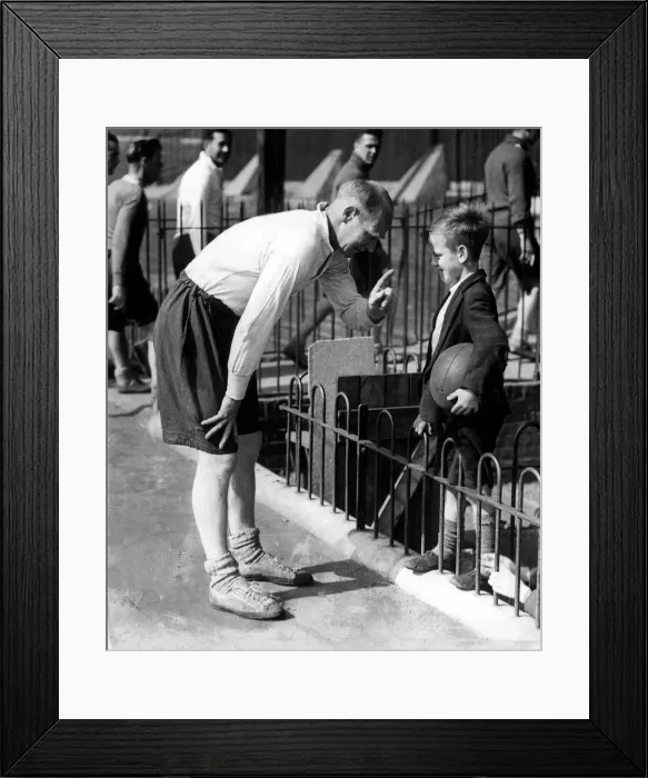 Framed Print : Charlton Athletic manager Don Welsh has a word with a young football fan before taking Framed Print : Charlton Athletic manager Don Welsh has a word with a young football fan before taking