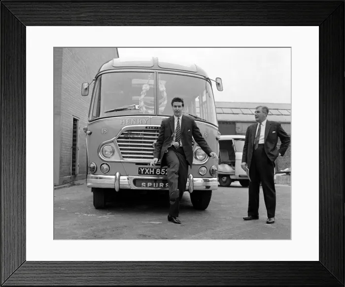 Framed Print : A Tottenham Hotspur player practicing kicks up with a tennis ball in front of the team