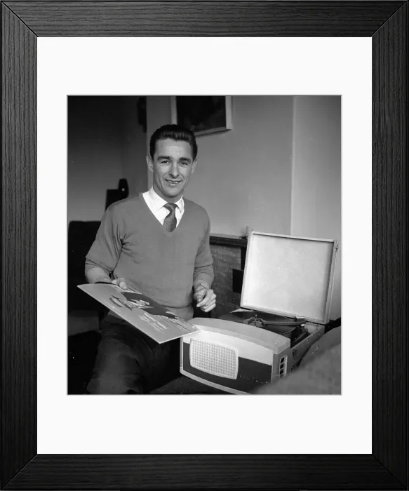 Framed Print : Brian Clough Sunderland FC seen here with his record collection at home Framed Print : Brian Clough Sunderland FC seen here with his record collection at home