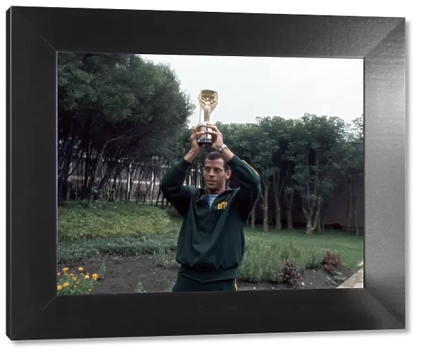 Brazil captain Carlos Alberto holds aloft the Jules Rimet World cup trophy following