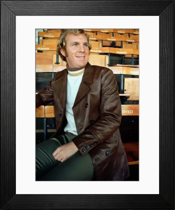Framed Print : West Ham United footballer Bobby Moore modelling a leather coat at Upton park