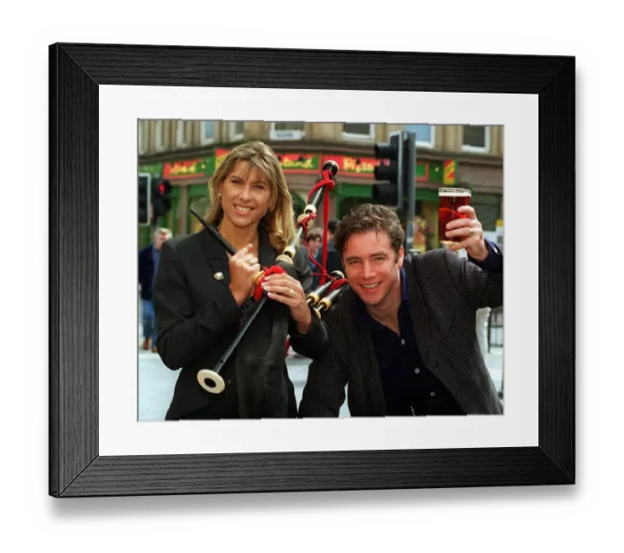 Framed Print : Ally McCoist Rangers football player holding up pint of beer
