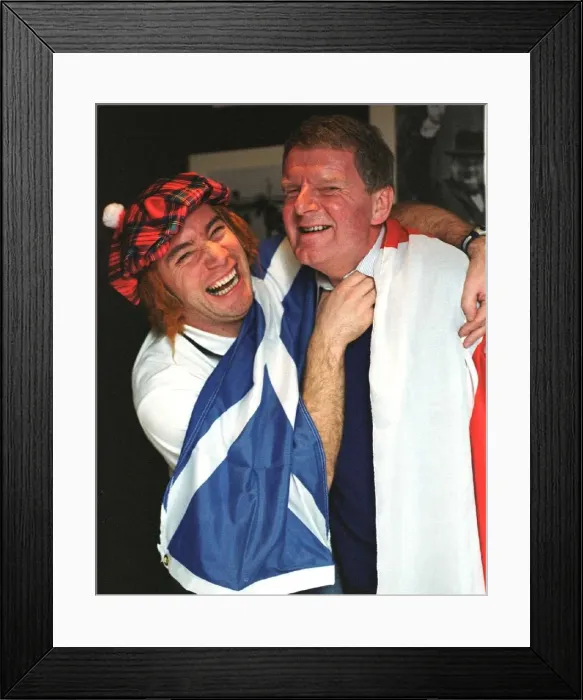 Framed Print : Friendly rivalry between football pundits Ally McCoist and John Motson ahead of Wembley