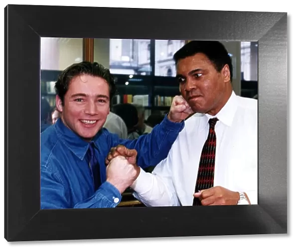 Muhammad Ali ex world champion boxer with Ally McCoist from Rangers Football Club