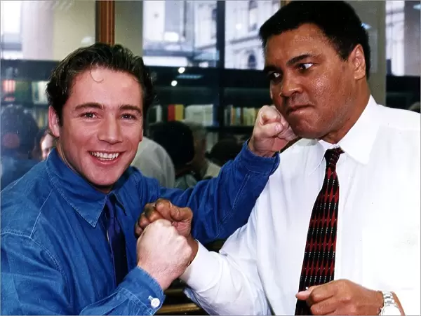 Muhammad Ali ex world champion boxer with Ally McCoist from Rangers Football Club