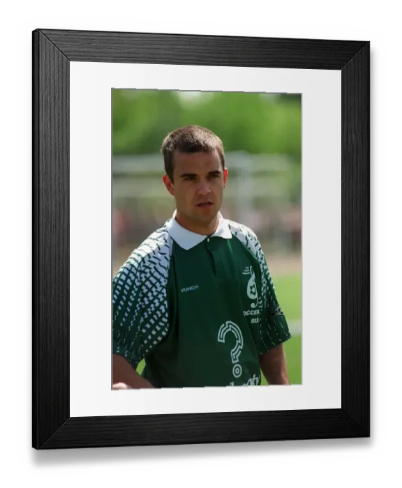 Framed Print : Robbie Williams Singer May 1998 Pop star playing in a celebrity football match Framed Print : Robbie Williams Singer May 1998 Pop star playing in a celebrity football match