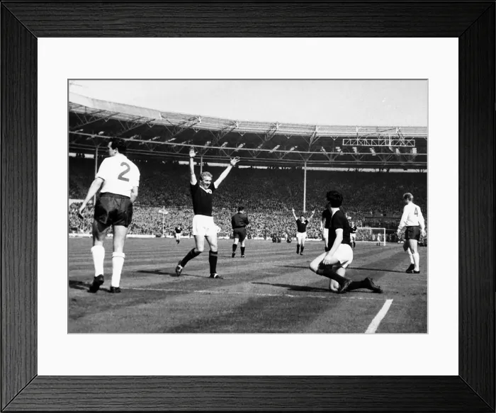Framed Print : Denis Law celebrating Jim Baxter goal against England April 1963 Framed Print : Denis Law celebrating Jim Baxter goal against England April 1963