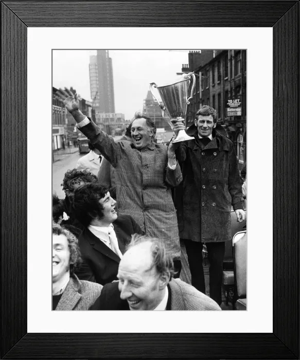 Framed Print : Manchester City manager Joe Mercer and Tony Dunne hold aloft the European Cup Winners Framed Print : Manchester City manager Joe Mercer and Tony Dunne hold aloft the European Cup Winners