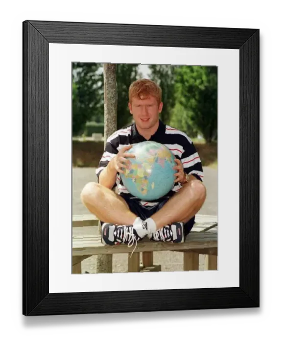 : England footballer Paul Scholes point out Romania on Globe : England footballer Paul Scholes point out Romania on Globe