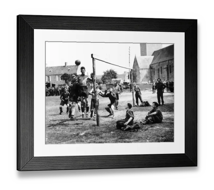 Framed Print : Gunners from a Royal Artillery battery enjoy a game of football during a brief respite Framed Print : Gunners from a Royal Artillery battery enjoy a game of football during a brief respite