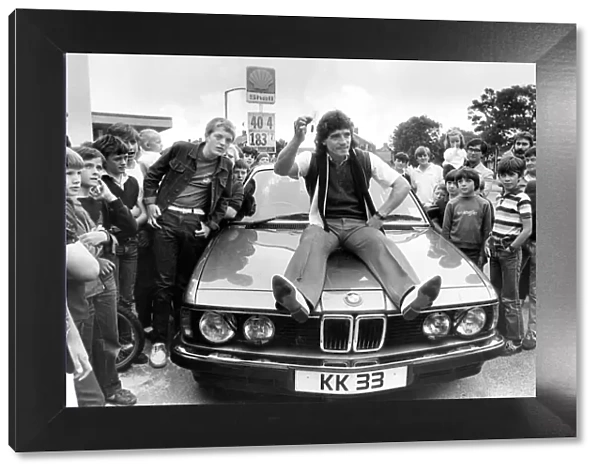 Kevin Keegan with his new £20, 000 BMW 732i which he can only keep as long as he