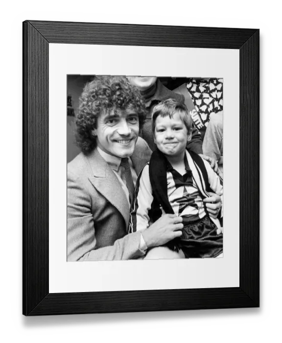 Framed Print : Kevin Keegan with five year old Robert Robertson at a furniture store opening Framed Print : Kevin Keegan with five year old Robert Robertson at a furniture store opening