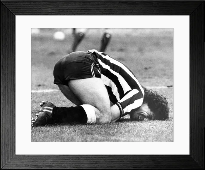 Framed Print : Kevin Keegan injured after crashing into the Grimsby keeper. Circa 1983 Framed Print : Kevin Keegan injured after crashing into the Grimsby keeper. Circa 1983