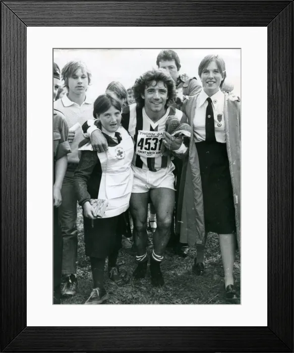 Framed Print : Kevin Keegan being helped by Red Cross girls in the Great North Run 1981