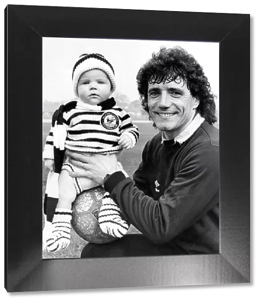 Kevin Keegan with four month old Ryan Gillon who is wearing his first Newcastle United