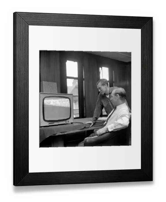 Framed Print : Arsenal Manager Bertie Mee and new signing Bob McNab watch T. V. October 1966 W9209-002