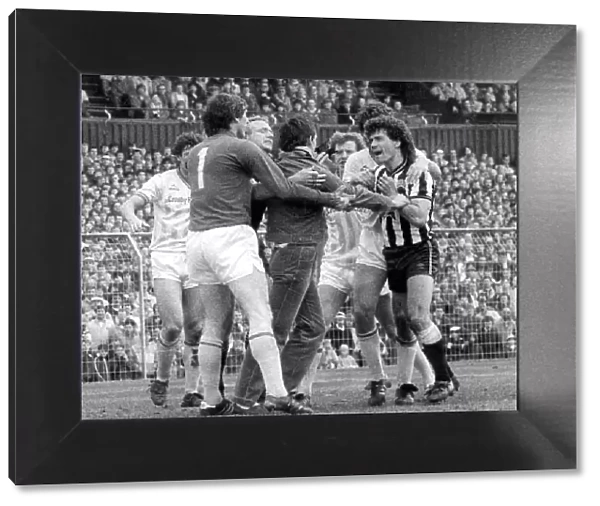 Newcastle skipper Kevin Keegan angered by a spectator who ran on the pitch