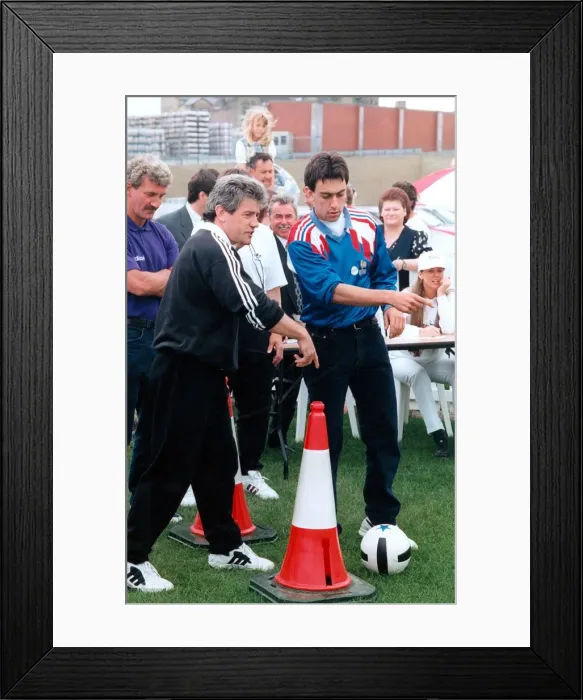 Framed Print : Kevin Keegan in action with the Young Hotshots competitors at the Eurofest Village during Framed Print : Kevin Keegan in action with the Young Hotshots competitors at the Eurofest Village during