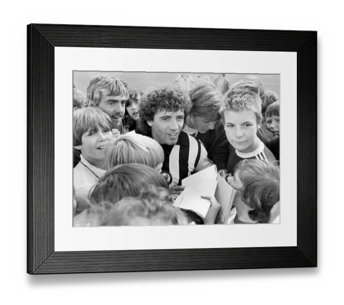 Framed Print : Newcastle United footballer Kevin Keegan is surrounded by young Newcastle fans during a