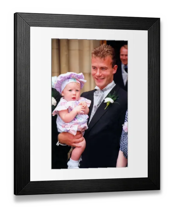 Framed Print : Alan Shearer with one of his daughters