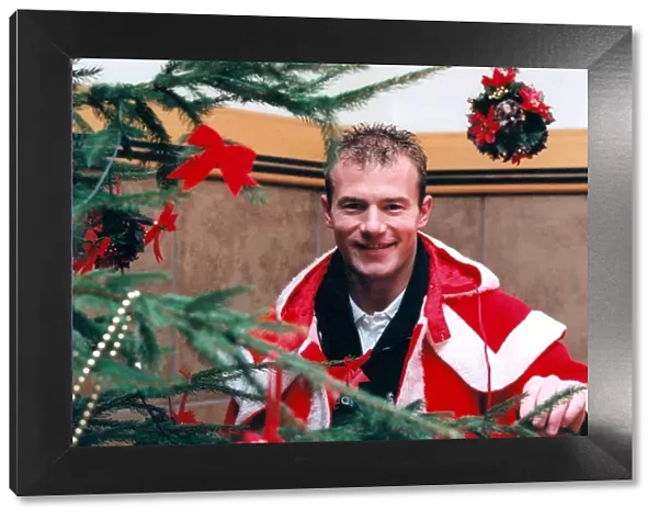 Alan Shearer taking on the role of Santa Claus