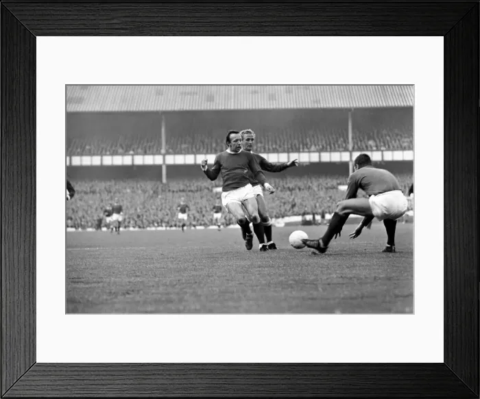 Framed Print : Nobby Stiles in action during the match between Manchester United and Everton Framed Print : Nobby Stiles in action during the match between Manchester United and Everton