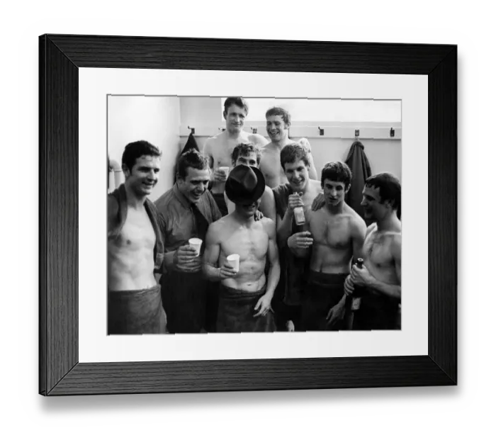 Framed Print : Everton hero, Johnny Morrisey, hides his face underneath his hat as the players celebrate