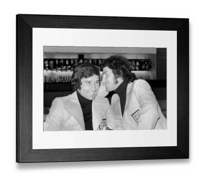 Framed Print : England footballer Gerry Francis whispers into new boy Colin Viljoen Framed Print : England footballer Gerry Francis whispers into new boy Colin Viljoen