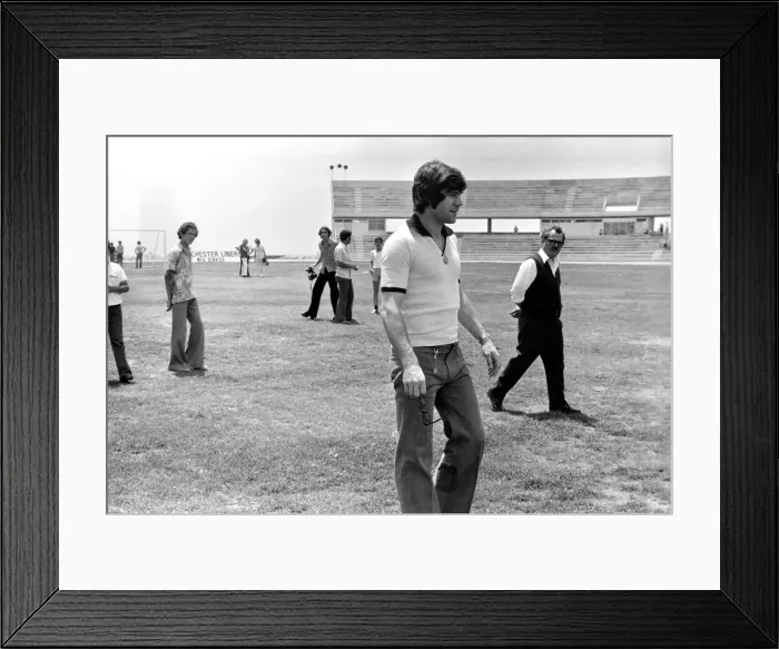 Framed Print : England footballer Malcolm MacDonald inspects the pitch before the European Championship