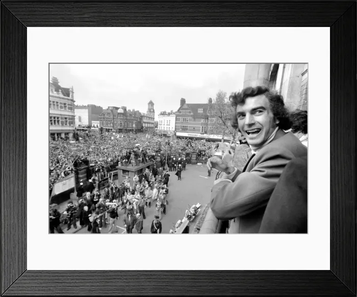 Framed Print : West Hams Trevor Brooking showing off the trophy to fans gathered below at Newham