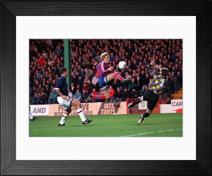 Framed Print : Jurgen Klinsmann scores for Bayern Munich against Raith Roversat during a UEFA Cup mnatch