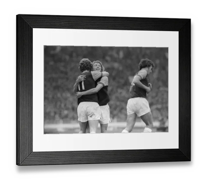 Framed Print : Alan Taylor gets a hug after scoring in FA cup final 1975 for West Ham against