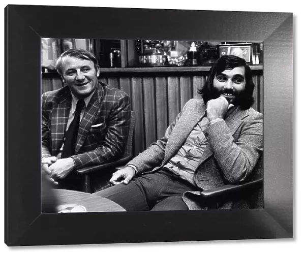 George Best Tommy Docherty both ex footballers sitting talking March 1974